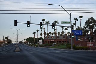 The Henderson city limits zigzag northward across Sunset Road at Annie Oakley Drive.