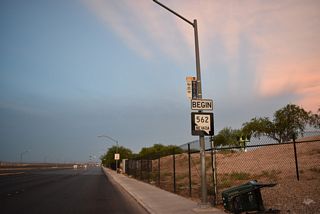 SR 562 begins along Sunset Road east from Las Vegas Boulevard (SR 604) along the southwestern boundary of Harry Reid International Airport (LAS).
