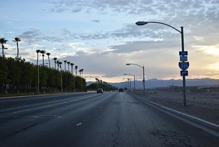 A loop ramp joins SR 562 (Sunset Road) west with unsigned SR 171 south to Interstate 215.