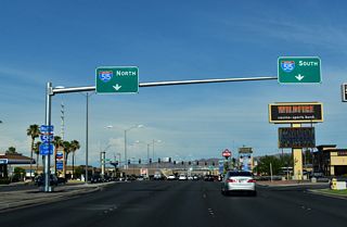 Sunset Road (former SR 582) runs east between Sunset Station Hotel & Casino and Galleria at Sunset mall in Henderson ahead of I-11/U.S. 93-95.