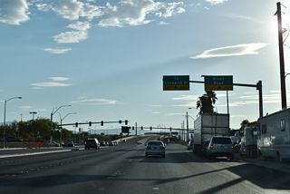 Sunset Road continues west from SR 562 and Las Vegas Boulevard to intersect Windy Road north ahead of the overpass across Interstate 15.