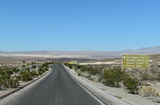 Lake Mead Parkway becomes Lakeshore Road at the intersection with Northshore Road. Lakeshore Road encircles the River Mountains south while following the western extent of Lake Mead southward to U.S. 93 Business near Boulder City.
