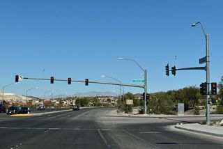 The succeeding traffic light on SR 564 eastbound is with Athens Avenue east and Olsen Street north.