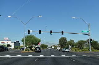 Basic Road north ties into SR 564 across from an entrance to the Lake Mead Crossing retail plaza.