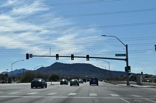 Lake Mead Parkway proceeds southwest from Warm Springs Road to intersect Burkholder Boulevard.