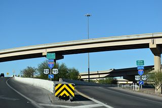 I-11/U.S. 93-95 overlap through southeastern Henderson to Railroad Pass. U.S. 95 turns south from near Boulder City to Searchlight and Needles, California.