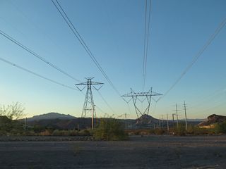 These towers have the capacity to be expanded to a double circuit 500kV system if needed. Companion towers support a 500kV power line that follows the third line, which is Path 27 (a 500kV Intermountain High Voltage Direct Current [HVDC] transmission line from Delta, Utah, to Adelanto, California).