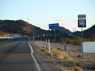 Nevada State Route 564 commences west where Lake Mead Parkway leaves Lake Mead National Recreation Area. Lorin C. Williams Parkway ties into SR 564 nearby from the gated Lakes Las Vegas community at the ensuing intersection.