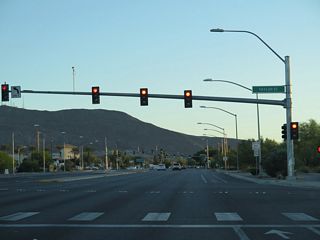 Taylor Street intersects SR 564 (Lake Mead Parkway) across from Victory Village Plaza shopping center.