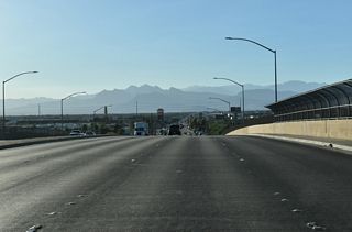 The eastern segment of SR 573 ends just ahead of Berg Street along the viaduct spanning Donovan Way and the Union Pacific Railroad.