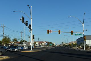 The north end of Nellis Boulevard ties into SR 573 (Craig Road). Nellis Boulevard south from SR 604 (Las Vegas Boulevard) to SR 593 (Tropicana Road) is SR 612.