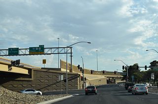 A service road connects the ramp linking I-15/U.S. 93 south to Washington Avenue with D Street nearby.