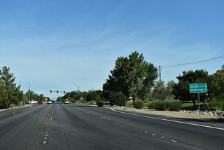 Remaining distance sign referencing U.S. 93 south to Boulder and U.S. 95 south to Searchlight.