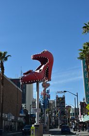 The Big Red Shoe was formerly mounted within a traffic island on Fremont Street north of 7th Street. It was relocated one block southward over a sidewalk by 2021.