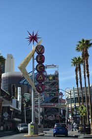 The Vegas sign preceding the Fremont Street Experience was also formerly located on a traffic island. The sign was relocated over the sidewalk beyond 6th Street.