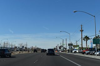 SR 582 (Boulder Highway) crosses Flamingo Wash ahead of Sahara Avenue (old SR 589). Sahara Avenue is a major arterial leading west along the Las Vegas city line to the Las Vegas Strip and Spring Valley.