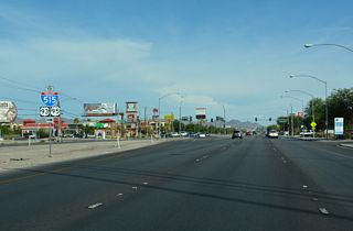 Russell Road crosses SR 582 (Boulder Highway) within a mile of the diamond interchange with I-11/U.S. 93-95.