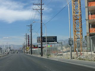 Construction of a turn bay for the Allure Las Vegas condominium high rise in 2007 resulted in the removal of what was a rare reassurance marker for SR 589 west.