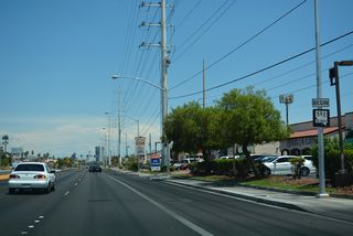 SR 592 commences east along Flamingo Road at the intersection with SR 595 (Rainbow Boulevard). A begin shield assembly follows.