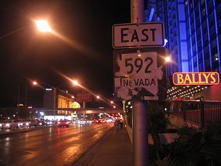 Flamingo Road is designated as Nevada 592 from Nevada 595 (Rainbow Boulevard) east to Nevada 582 (Boulder Highway). This reassurance shield was posted on eastbound Nevada 592 (Flamingo Road) after the intersection with Nevada 604 (Las Vegas Boulevard). The shield was gone by 2008.