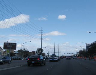 After the Paradise Road intersection, eastbound Flamingo Road (Nevada 592) approaches the turnoff to the Atomic Testing Museum.