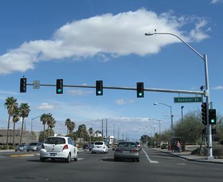 Eastbound Flamingo Road (Nevada 592) meets Spencer Street at this signalized intersection.