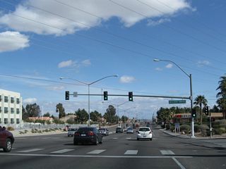 Eastbound Flamingo Road (Nevada 592) meets McLeod Drive at this traffic signal.