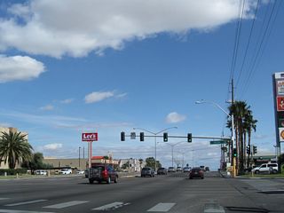 Continuing east, Flamingo Road (Nevada 592) meets Pecos Road at this intersection. Follow Pecos Road south to Interstate 215 and Nevada 146 (St. Rose Parkway).
