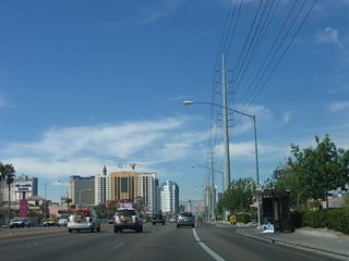 Nevada 592 (Flamingo Road) west after the intersection with Paradise Road (Former Nevada 605). The towers of the Platinum Resort and Bally&apos;s Resort are visible ahead; Bally&apos;s is located at the intersection between Flamingo Road and Las Vegas Boulevard.