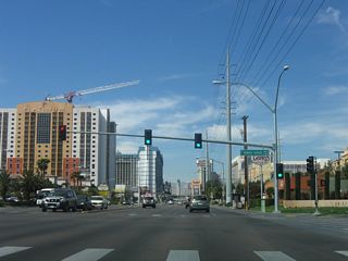 Westbound Nevada 592 (Flamingo Road) meets Howard Hughes Parkway at this signalized intersection.