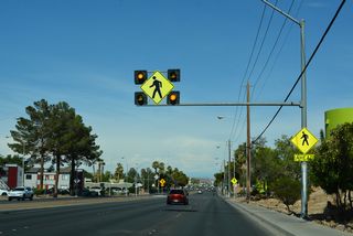 SR 593 (Tropicana Avenue) intersects Morris Street at a midblock crosswalk.