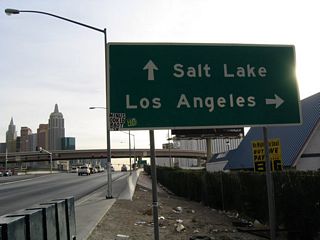 Eastbound Tropicana Avenue at Interstate 15. The right lane exits onto Interstate 15 south to Jean, Primm, and Southern California (with a control city of Los Angeles).
