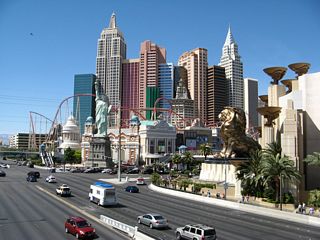 A slightly angled view from the pedestrian bridge offers a full view of the New York New York resort skyline.