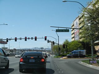 A ground-level view shows the intersection between Tropicana Avenue and the New York New York Driveway.