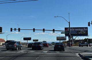 Koval Lane extends north from Reno Avenue and general aviation services at Harry Reid International Airport (LAS) across Tropicana Avenue to Sands Avenue.