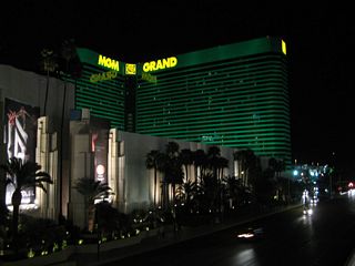 The green-hued MGM Grand resort and hotel rises along on the north side of Tropicana Avenue east of Las Vegas Boulevard.