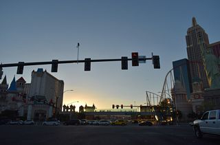 Westbound Tropicana Avenue enters the intersection with Las Vegas Boulevard with seven lanes.
