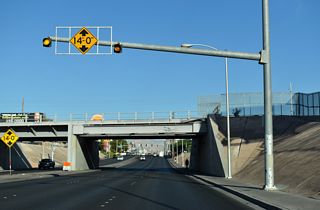 Dropping below grade, Tropicana Avenue passes under a Union Pacific Railroad line west of Valley View Boulevard.