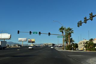 Frank Sinatra Drive comprises the east side frontage road for Interstate 15 along the Las Vegas Strip. The service road loops southwest from Russell Road to pass under SR 594 at a grade separation adjacent to the freeway.