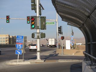 The northbound on-ramp to Interstate 15 merges onto a collector distributor roadway extending north to SR 593 (Tropicana Avenue).
