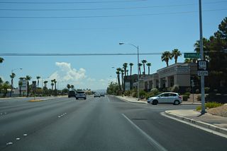 SR 595 reassurance marker posted along Rainbow Boulevard south of Sahara Avenue at Laredo Street. Sahara Avenue was formerly SR 589 east from SR 595 to SR 612 (Nellis Boulevard).