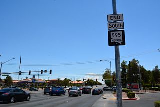 An end shield for SR 595 appears where Rainbow Boulevard south intersects Tropicana Avenue. Tropicana Avenue east is part of SR 593 between I-15 and the Las Vegas Strip.
