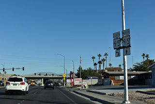 SR 596 (Jones Boulevard) north meets I-11/U.S. 95 at a parclo interchange.