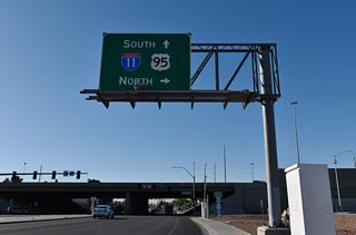 SR 596 resumes along Jones Boulevard southbound at the parclo interchange (Exit 80) with I-11/U.S. 95.