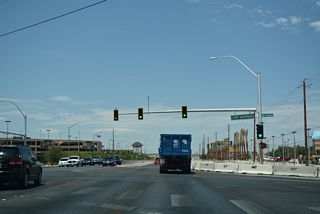 Lone Mountain Road travels across northwest Las Vegas west from Los Prados golf course community to Tenaya Way and again north of Lone Mountain (el. 3,342 feet).
