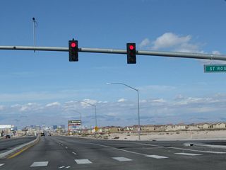 Las Vegas Boulevard northbound meets SR 146 (St. Rose Parkway) at this traffic signal. SR 146 west ends at parallel Interstate 15 nearby. The arterial route angles northeast to I-215 at Pecos Road in Henderson.