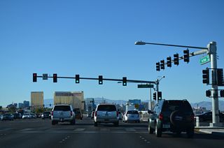 Sunset Road runs along the north side of Town Square and along the southern perimeter of Harry Reid International Airport (LAS). Sunset Road east to Henderson is SR 562.