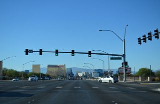A signalized entrance to Town Square follows the flyover north of I-215/CC-215 on Las Vegas Boulevard.