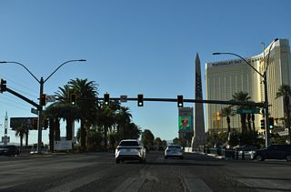 Reno Avenue joins Las Vegas Boulevard with Excalibur and the Luxor west to Frank Sinatra Drive, the east service road for Interstate 15.