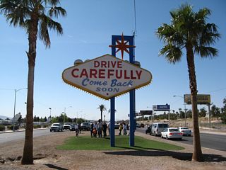 The back side of the "Welcome to Fabulous Las Vegas" sign invites visitors to return. The sign stands within the median of Las Vegas Boulevard midway between Russell Road and Sunset Road.